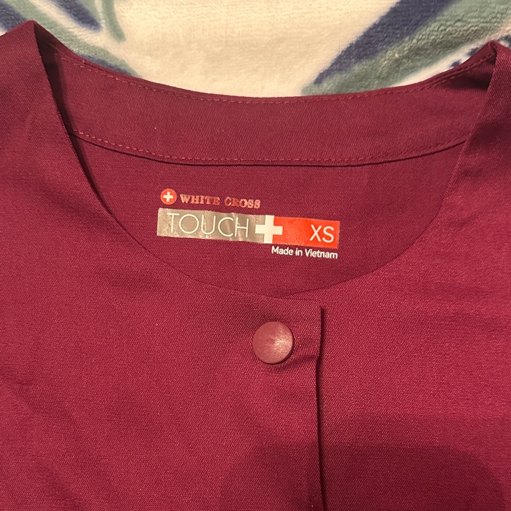 White Cross Touch Plus Maroon Top